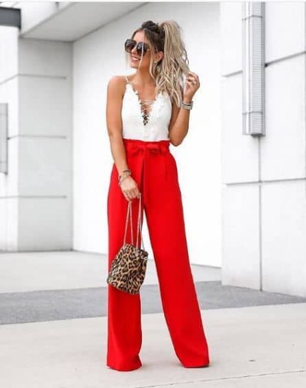 Valentine's Day outfits - white lace tank top tucked into red flared waist tie pants.